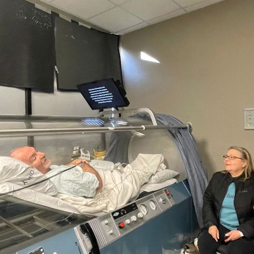 patient in hyperbaric oxygen therapy chamber