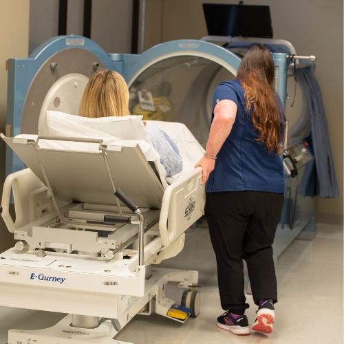 patient entering hyperbaric oxygen therapy chamber